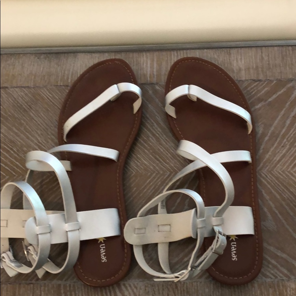 LIKE NEW SILVER GLADIATOR SANDALS 11M. SEVEN DIALS